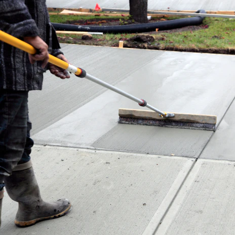 service 2 smoothing and finishing the new concrete driveway 1